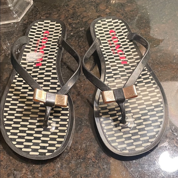 Coach Shoes - COACH Women’s Black Flip Flop Sandals with Gold Accent